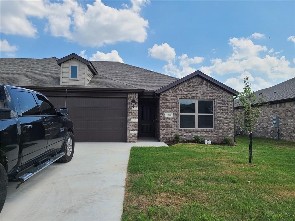 Newer duplex in great location with lawn care included! Close to the Wal-Mart Neighborhood Market on Hwy 102 and Greenhouse Rd in Bentonville, 3 bedroom split plan, 2 baths, open living space, wood look tile in main living space and carpet in the bedrooms. Kitchen has gas range, granite and pantry. Refrigerator and washer & dryer provided. Wood privacy fence back yard. No smoking. Pets negotiable with owner approval.