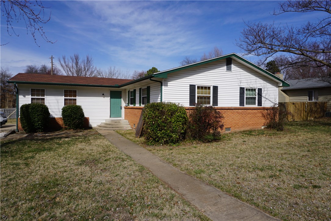 Cute three bedroom house in Rogers School District. Wood floors. Eat in kitchen. Storage building. Patio for outdoor grilling or entertaining.