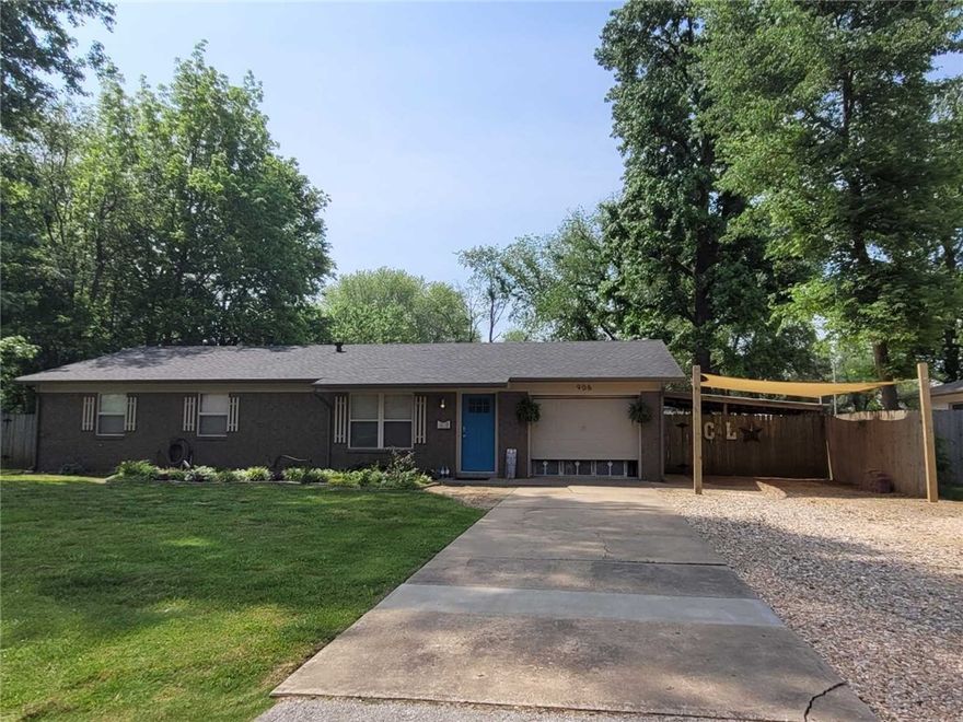 This well-located, beautifully appointed home is a short walk from the new Walmart Home Office campus, the Momentary & 8th Street Market, and downtown Bentonville.