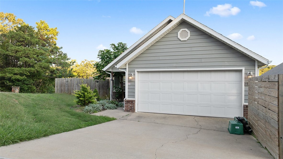 Discover this charming 3 bedroom, 2 bath home in West Fayetteville. Tucked away as the last house on a peaceful dead-end street, it offers a sense of privacy while still being close to everything you need. Inside, the inviting layout centers around comfortable living, while a brand new roof to be installed on 9/24 will provide peace of mind for years to come. Step outside to a delightful backyard patio, perfect for morning coffee, evening dinners, or relaxing weekends at home. With its blend of charm, updates, and a sought-after location, this home is ready to welcome you. Approved borrowers will receive a closing cost credit of 1% of the loan amount up to $5,000 on their Closing Disclosure on their loan closing with Envoy Mortgage Branch NMLS #2659248 and Branch NMLS #2579798.