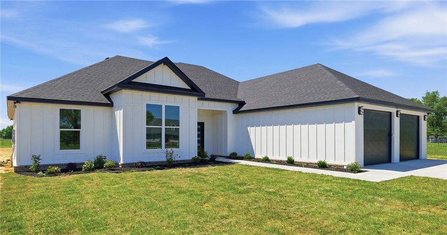 Gorgeous new construction home on 1.5 acres, offering 2,500 sq ft of style & functionality! This 4-bedroom, 3 full bathroom home is conveniently located south of Tontitown in West Fayetteville & designed for modern living, featuring an open floor plan ideal for entertaining & everyday comfort, along with beautiful finishes & vaulted ceilings throughout for added warmth & character. Primary suite is a true retreat, featuring a massive walk-in closet with extensive built-ins, including two full dresser systems, while the en-suite bath offers a dual vanity, walk-in shower & relaxing soaking tub. Front bedroom includes a built-in desk with overhead storage, perfect for a home office, study space, or creative area. Step outside to the covered patio with vaulted wood plank ceilings & an oversized fan, creating a great space to relax or entertain year-round. Enjoy the privacy of 1.5 acres while still being minutes from town—style, space & location come together in one exceptional opportunity you do not want to miss.