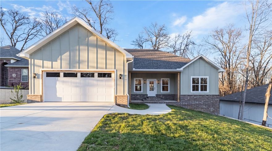 Trail-Connected Living in the Heart of the Ozarks
Welcome to a home where the outdoors is not just nearby—it’s part of your backyard. This beautifully situated Bella Vista property offers direct, on-lot access to one of the community’s renowned mountain bike trails, giving riders, hikers, and nature lovers an unmatched lifestyle right out the back door. Inside, the home showcases inviting living spaces, warm natural light, and thoughtful design elements that pair perfectly with the wooded surroundings. Whether you’re relaxing on the deck, hosting friends, or gearing up for a morning ride, this home blends comfort with adventure. Just 1 mile away, you’ll find the Tanyard Creek recreational area, known for its waterfalls, walking paths, and scenic bridges, along with the Bella Vista Driving Range, perfect for golfers looking to sharpen their swing between trail sessions.