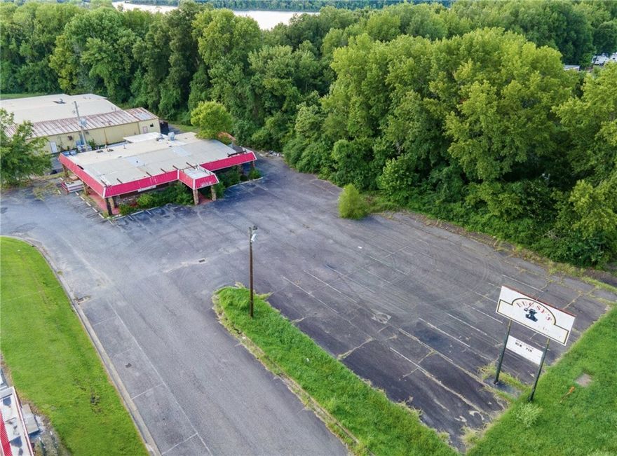 1.7 +/- acres of C2 Highway Commercial property in Russellville, AR with Highway 7 frontage and an existing 4,916 square foot structure on site. The property offers excellent visibility along one of the area's busiest corridors. Well-suited for redevelopment or repositioning for a variety of highway-oriented commercial uses.