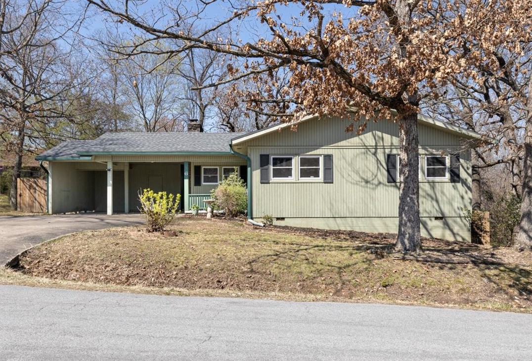 Experience the true Bella Vista life in this classic home. Located less than 1/2 mile to the Landline, Tweedy Bird & Tunnel Vision Loop & only 1 mile to Lake Windsor! This home would be a great primary home or investment opportunity. Access near I-49 & Hwy 71 along with local amenities that include a pool, tennis courts & a playground. In addition to the 2 bedrooms, you get a bonus room with large closet or could be used as an office, craft room, second living or an extra bedroom. Pop out the back door onto the raised level deck with direct access to the carport before heading down to the backyard for nights around the fire pit. A ground level storage room on the back of the house is complete with shelving & a concrete floor plus a separate workshop located in the partially enclosed double carport. Washer, dryer & fridge convey with offer. This home is listed with a warranty from American Home Shield that will convert to the new homeowner for one year atāāāāāāāāāāāāāāāāāāāāāāāāāāāāāāāā closing.
