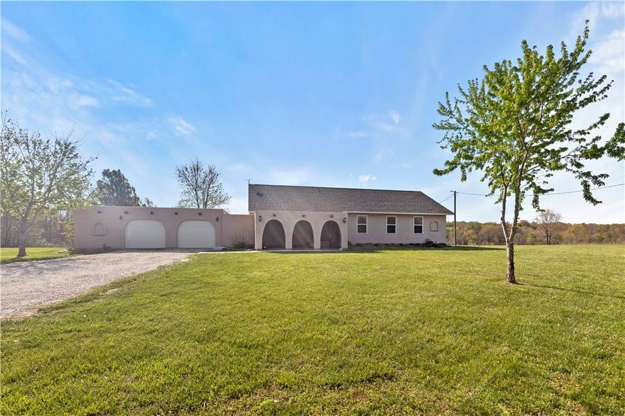 Enjoy peaceful country living on just over 10 acres with this well-maintained 2-bedroom, 2-bath home, built in 2013. With 1,540 sq ft of thoughtfully designed living space, the home features a bright, open layout perfect for comfortable living and taking in stunning sunrise and sunset views.

Outside is where this property truly shines. Raised garden beds are ready for planting, and outbuildings provide convenient storage for tools and equipment, easily add in a chicken coop, offering a great start for anyone interested in homesteading. The spacious yard and open land offer plenty of room for outdoor entertaining, with space for everything from cookouts to quiet evenings under the stars. Take it up a notch with the fire ring ready to bring on those outdoor memories.

Conveniently located just minutes from Highways 65, 62, and 412, you get the best of both worlds—peaceful, private acreage with easy access to nearby towns and amenities.