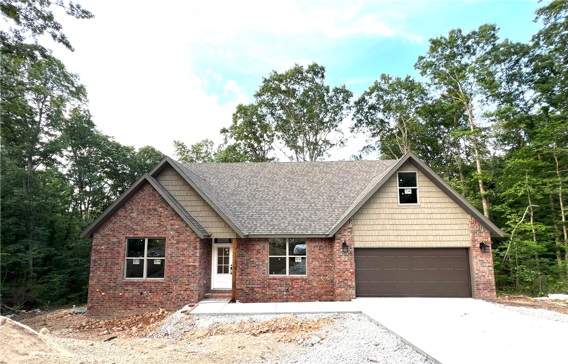 This two-story new construction has a unique feature that overlooks the living room...a cat-walk! The spacious primary bedroom and bathroom are located on the first floor for easy living. The full-featured kitchen is equipped with under-cabinet lighting, 3cm granite, GAS STOVE, and a pantry. The second story has a bedroom on each side of the house (with walk-in closets) and full bathroom to ensure occupants have maximum privacy. Above the garage is a bonus room that can be used for anything your heart desires! The covered deck is the perfect place to entertain guests or just relax after a long day. Last but not least, there is a concrete pad in the crawlspace that would be great for a workshop and/or storage. **There will be no fireplace in this home-photos do not reflect. Photos do not reflect gas stove**