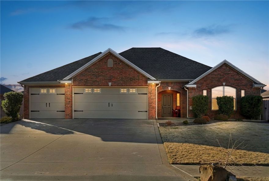 Stunning one-level all-brick home sitting directly across from Harvest Park with picturesque views of the pond and McKissic Creek. This well-maintained 4-bedroom home features a thoughtful split floor plan, beginning with a grand entryway that sets the tone throughout. The kitchen is a standout — rich cabinetry, thick black granite counters, stainless appliances, and a large pantry. Three secondary bedrooms share a full bath with double vanity, granite counters, and ample linen storage. The spacious primary suite includes a double vanity, wrap-around walk-in closet, walk-in shower, jetted tub, private water closet, and extra built-in storage. Recent updates include a newer roof (2021), wood flooring, and water heater (2019). Entertain outdoors on the back patio under the custom pergola with café lighting, or enjoy the raised-bed garden already in place. Oversized 3-car garage for all the bikes, toys, and extras.