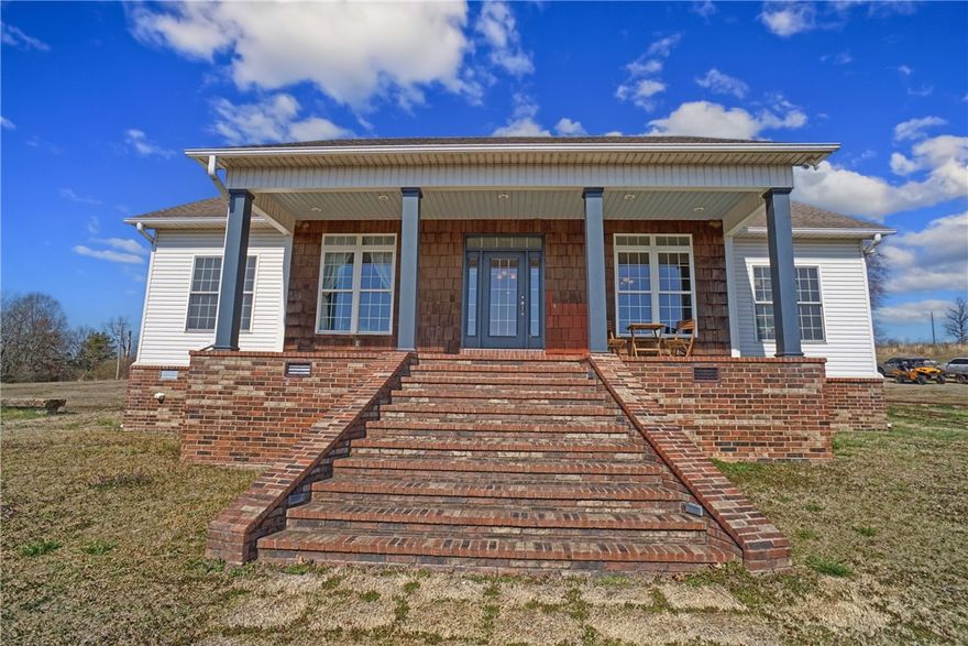 If you want to see the best view of White Oak Mountian from your front porch and kitchen window then you need to see this home.  The house is fantastic inside and out.  There is wood and tile in every room with tall tray ceilings and lots of trim. The kitchen has tons of cabinets and the appliances have been updated.  The mountain view is showcased in this area as well.  There are three bedroom and three and one half baths. It has a large living room and a sunroom that gives you more space to live.  If that was not enough there are almost 7 park like acres for a yard.  If you like to hunt you are 1.5 miles from national forrest and there are several creeks within 3 miles if you are a fisherman.  This is one of the nicest homes on the market but don't take my word for it come see for yoursllf. You won't be dissapointed.