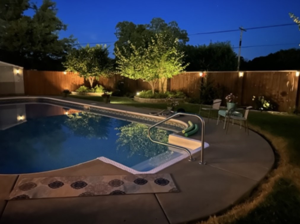 WOW~WOW~WOW~ Home is perfect~ Swimming pool, heated so extends usable time for spring & fall. Privacy fenced backyard adds value enjoying your pool. Lots of flowers add to the allure of your oasis. Huge covered patio overlooking swimming pool...+... you are close to downtown Rogers! If you need a change this will definitely add dimension to your home time! Time with the ones that matter the most, cooking out and enjoying swimming or just relaxing! Also dogs love water too! All Brick, Oversized Main Bedroom & bath with Walk-in Tub!!! Main bedroom also has a pan ceiling adding depth to this room. The kitchen has granite and glistening white cabinets, lots of counter space & breakfast bar, You will enjoy the size of the living room & large windows to outside. That's not all with a dining area that overlooks the pool area! 3 Bedrooms, 2 baths, 2 car garage + extra parking in driveway. Well maintained just waiting for you to enjoy the rest of your summer here! Imagine floating in the pool and gazing at the full moon!