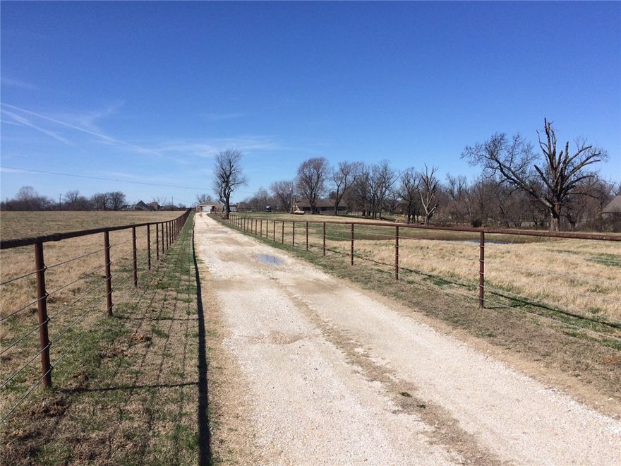 In Springdale city limits, across street from proposed "Shaw Family Park" to be started in 2018. Close to Shaw Elementary School with subdivision on North and West side of property .