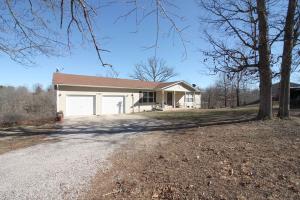 Perfect Location Just Minutes Outside of Harrison on 3.1 Ac! A very solid built home by contractor/owner. Nice Deck off Kitchen to enjoy the peaceful setting! Roof new in 2014. Finished Basement w/ 9 foot ceilings w/ poured concrete walls & host 2 Bedrooms, large bath w/ jetted tub, walk in shower, & large 42'6 X 13' family room. Bedrooms each have two closets. Nice 30'X23' Workshop/Garage!