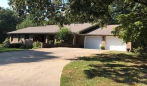 Perfect for your growing family! This 2000 sq. ft. custom built home is all on 1 level - 3 BD, 2 BA, and wheelchair accessible. Located near the end of a culdesac offers safety and privacy from thru traffic. This home offers many features - a large kitchen w/ ample counter space & cabinets, and a built in pantry. The spacious dining room adjoins the large family room. Double doors open to a beautiful cover patio on the back of the home perfect for relaxing or barbecues. The front covered brick patio is ideal for the morning cup of coffee. Both bathrooms offer lots of counter space. The spacious laundry room provides additional space w/ built-in desk for a personal office. The attached 2 car garage could easily fit a bass boat or ATV. This home has been well loved and maintained.