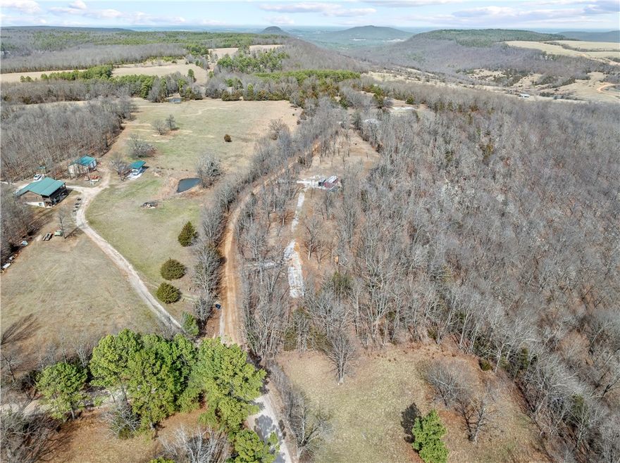 Mountain Views w acreage – Ready for Your Cabin or RV Retreat.
This beautiful 3.5± acre property has been partially cleared and thoughtfully prepared for your mountain getaway. The land features two elevated cement pads overlooking scenic mountain views—perfect for a cabin, RV site, or relaxing retreat. One pad is ready for a gazebo, providing the ideal spot to enjoy the surrounding landscape. The property also includes two newly built wooden entrances with steel gates, offering both convenience and security. Additional improvements include: Two new water meters with two approved perc tests. New unfinished cabin ready to be customized to your needs. Hiking paths throughout the property, enhanced with new topsoil and regularly maintained. 
Whether you’re looking to build, create a weekend retreat, or invest in land with improvements already in place, this property offers privacy, views, and excellent potential.