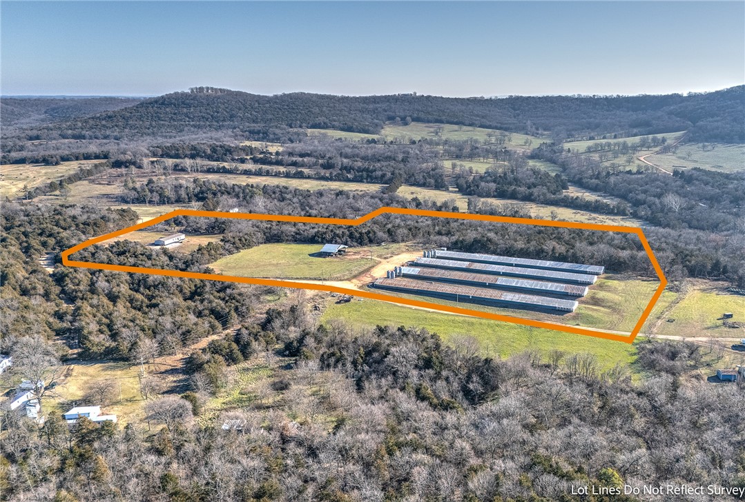 This exceptional Tyson broiler farm offers a rare opportunity to own a thriving agricultural business with four 40’ x 400’ chicken houses, all under a secure contract with Tyson until 2030. With nearly 24 acres of land, this property provides ample space for expansion, whether you’re looking to add additional chicken houses or build your dream home on-site. The farm is well-maintained and designed for efficient, modern poultry operations, ensuring consistent production and profitability. The property also includes a nearly new 1,924 sqft manufactured home on a concrete runner permanent foundation featuring 4 bedrooms and 3 bathrooms. The open acreage offers flexibility for future growth, making it ideal for seasoned farmers or investors seeking a lucrative venture in agriculture. Don’t miss your chance to own this income-generating property (grossed over $211K in 2024) with plenty of potential for customization and expansion.