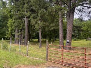 Excellent opportunity to be out of town, but minutes away from I-40 access. Build your home, or develope this property into an RV rental or campsite with lake Atkins just around the corner.