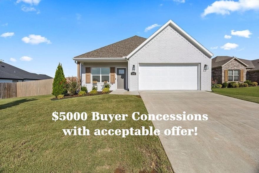 This one is special! Not your typical Riverwalk floor plan and lot size, this beautifully maintained home stands out with thoughtful upgrades, spacious layout, and a large .27ac lot.  Just minutes to downtown Fayetteville and the UofA Campus! Beautiful wood floors flow through the living room, kitchen, and main-level primary bedroom. Open concept kitchen features ceiling-height cabinetry, quartz countertops, large island, walk-in pantry, gas range, and farmhouse sink. The very spacious main-level primary suite offers an ensuite bathroom and 10x6 walk-in closet. Upstairs, enjoy a flexible bonus room/workout space plus two generously sized bedrooms and ample storage. Step outside to a beautifully landscaped backyard, complete with an extended patio for outdoor living.  Frigidaire French door refrigerator & GE washer, and dryer convey.  Truly move-in ready and better than new!