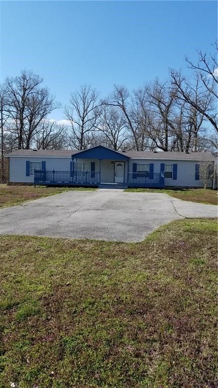 Lease $1400.00 Deposit $1400.00 Large 3bedroom 2 bath double wide. Large kitchen, dinning room and living room and even a sunroom. Sitting on approximately 3 acres with a garage/workshop. Beautiful country views. Pets negotiable with a $300.00 refundable pet deposit and $ 50.00 Per month pet rent. You will need mowing equipment as the tenant does mow the property. All applicants 18 and over, $35.00 credit/criminal history fee. Agent owned property, leased by property management