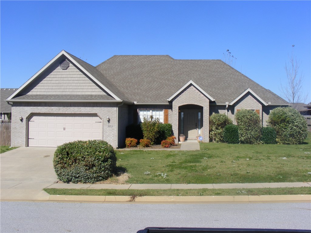 Beautiful all brick, 3 bed, 2 bath home in a private enclosed neighborhood. Nice sized lot with privacy fence surrounds this home with a great layout, including split floorplan, large living room with tray ceilings leading into a formal dining and kitchen. Wood floors with granite tile tops in the kitchens and bathrooms. Plenty of space in the rooms, bathrooms, utility room and closets. Large outbuilding and even a storm shelter in the garage. Move in ready. Agent owned.
