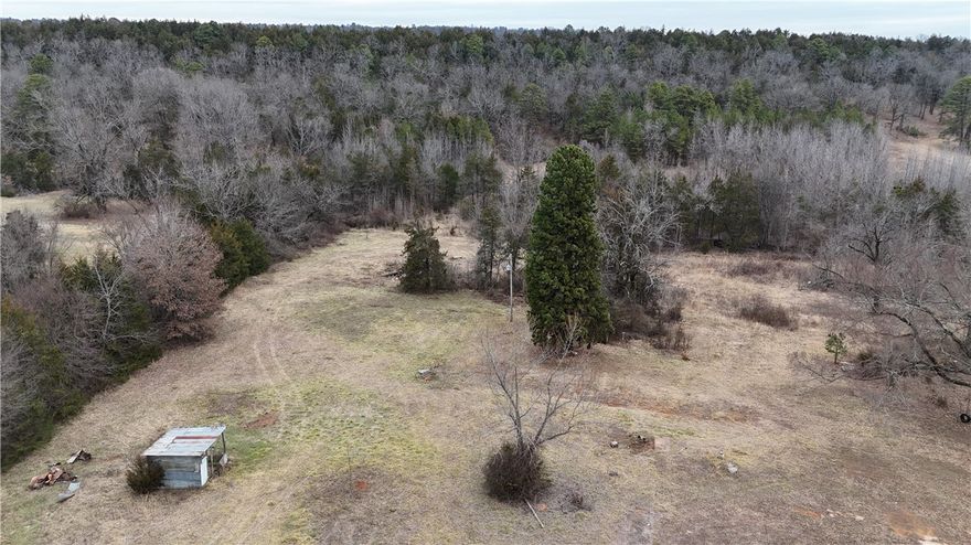 23+/- acres ready to build and hunt in Logan County


 ¾ mile off hwy 109, on Six mile Rd, is 23+/- acres ready to build your dream home or a weekend get away. Approximately 6.5+/- acres lies on the north side of Six Mile Rd. Water, electric and Wave Rural internet are already available. The remaining 16.5+/- lies on the south side of the road.

 Open hardwood and cedar timber will offer ample hunting opportunities. Numerous rubs and intersecting deer trails cover the ridgeside. A large draw runs from Six Mile Rd south to the top of the ridge creating a natural travel corridor for game.

 There are 2 ponds, one on each side of the road, with minor clearing an owner could graze 2-3 horses or cattle. 10 minutes to Paris, 9 minutes to Magazine, 35 minutes to Mount Magazine State Park.