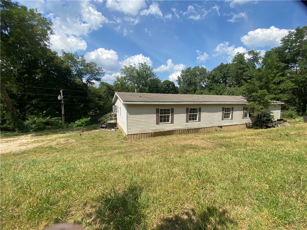 Country living on 1.24 acres. Offering plenty of space and potential, this property is perfect for someone looking to put in a little TLC and make it their own. Enjoy the peaceful setting with room to have a garden or chickens.