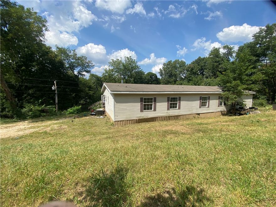 Country living on 1.24 acres. Offering plenty of space and potential, this property is perfect for someone looking to put in a little TLC and make it their own. Enjoy the peaceful setting with room to have a garden or chickens.
