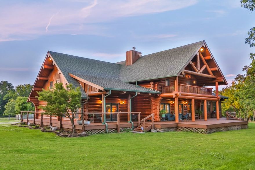 Red Horse Lodge, a high-end luxury Engelman Spruce log home/retreat w/massive soaring 28 ft cathedral ceiling in great room w/massive stone fireplace. Situate atop a private hill on approx 28 acres overlooking the beautiful Boston Mountains. Sun room. Office/study. Covered porch w/awesome southern views. Back-up generator. Passive solar features. Four stall horse barn. Horse & ATV trails. Hunting. close to State Parks, National Forest, lakes, rivers & 3 fortune 500 Company headquarters. Open to trades!