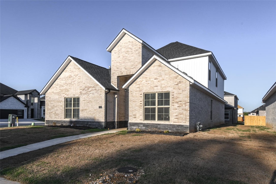 Stunning New Construction –Seller offering to pay $3000 towards Buyers Closing Costs & give Buyer $3000 toward any upgrades! This exquisite new construction home features 5 spacious bedrooms, 3 full bathrooms, & a versatile bonus room—perfect for a home office or play area. This all-brick beauty boasts high-end finishes and modern design throughout. Step into the gourmet kitchen, a chef’s dream wi/custom cabinetry, quartz countertops, large island, stainless steel appliances, & a gas cooktop. The open-concept layout flows seamlessly into the living area with soaring ceilings and a cozy fireplace. The primary suite offers a spa-like retreat with a luxurious en-suite bath, complete with a soaking tub, tiled shower, and dual vanities. Additional bedrooms provide ample space and comfort. Enjoy outdoor living on the covered patio and corner lot. Located in a sought-after neighborhood with easy access to shopping, dining, & top-rated schools.