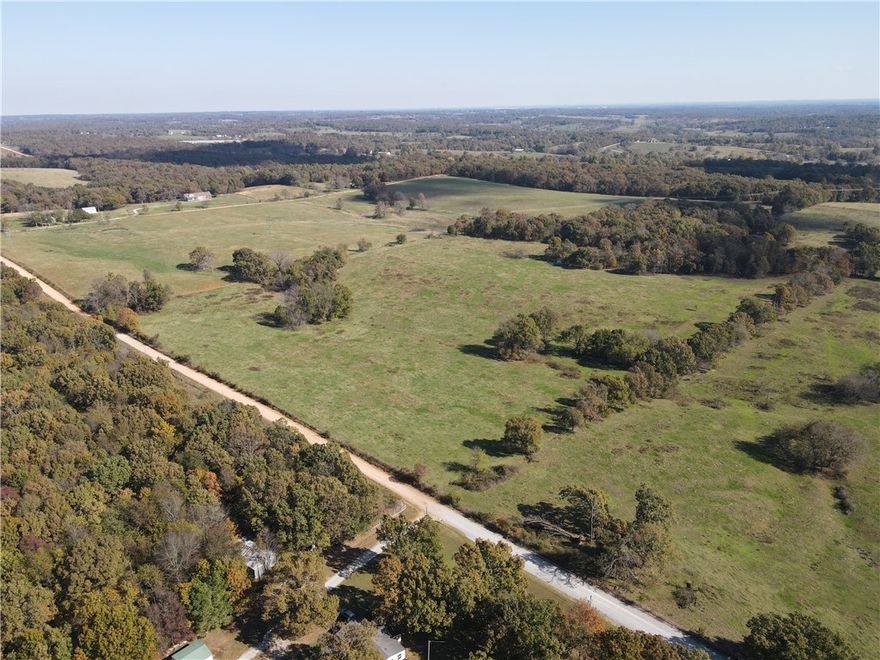 It’s not often that a tract of this size comes available anymore in this part of Benton County.  Located about halfway between XNA airport and Siloam Springs, this area is poised for more growth.  A short drive down Readings road, just south of Springtown, AR, leads the buyer to the beautiful rolling pastures and gorgeous hardwood timber that this property has to offer.  Being close enough to town for convenience, but far enough out for hunting and star gazing, this farm is going to check a lot of boxes.  It is fenced and cross fenced for cattle, includes 6 ponds, and has excellent terrain for building a home or homes almost anywhere on the property.  The wildlife habitat is incredible, and over 160 acres of the land is already grazable or easily improved to more grass.  The possibilities are endless with regard to building, subdividing, hunting, or livestock.