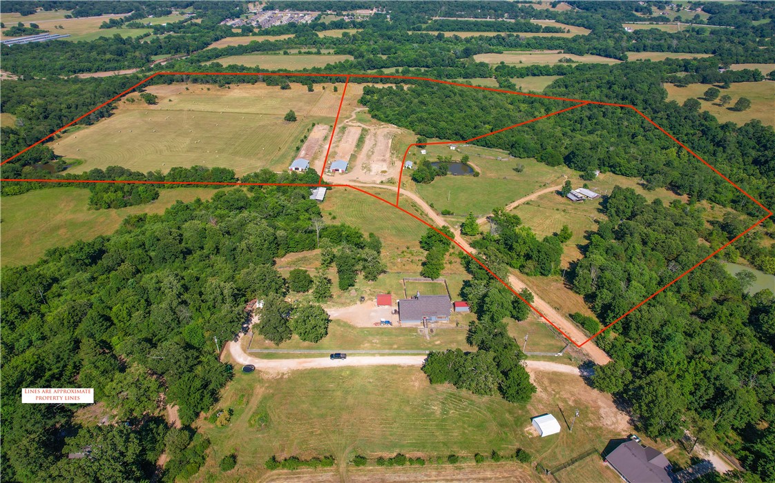 26.68 +/- acres with Creek, views, pasture, mature trees. This property has lots of options with desirable location just east off Greenland exit. Appt only, must be accompanied by agent for viewing.