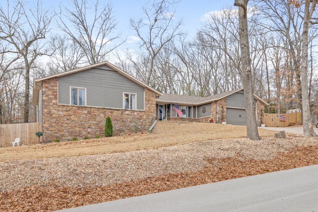 Remodeled home with stunning indoor & outdoor spaces! Close to the Kingsdale golf course, pool, tennis, and Lake Windsor! This home has ALL the details including custom beams, wainscotting, real wood flooring, shiplap ceilings, furniture style vanities, wide baseboards, and more. Outdoors you will find multiple luxury spaces as well as a screened in porch, deck, firepit, leveled play space! Walk out finished basement that offers incredible entertainment options AND a huge workshop/storage space!