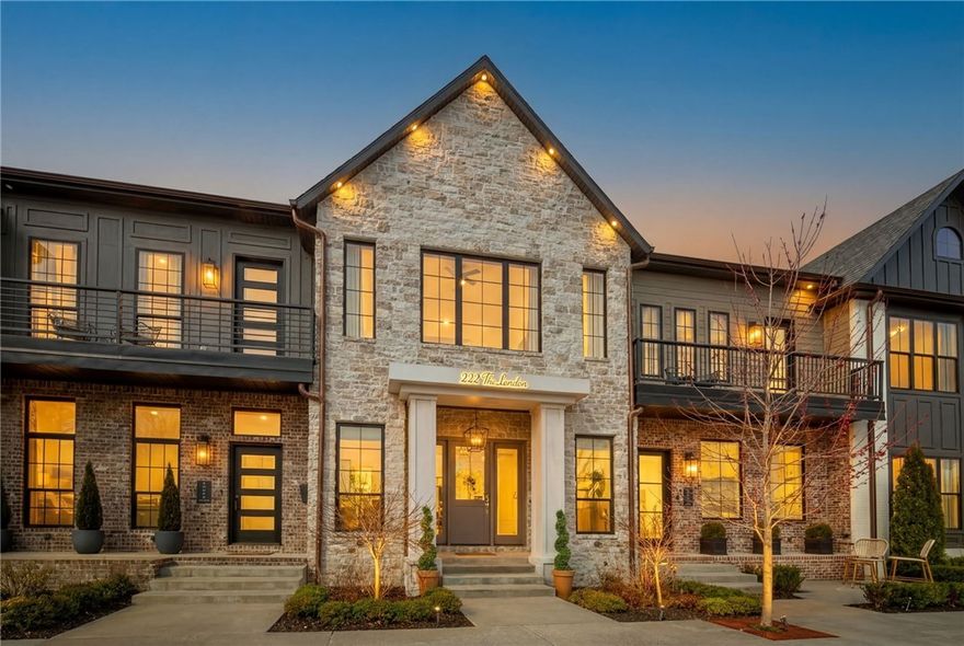 Welcome to The London, a rare opportunity to own a versatile, income-producing property in the heart of Downtown Bentonville zoned for residential, or potential commercial use. Spanning approximately 2,500 square feet across two levels, this thoughtfully designed townhome features four private bedrooms, an additional upstairs living area with a full-size sleeper sofa, and two full + two half bathrooms, comfortably accommodating up to nine guests. The primary suite offers a king bed, private en suite bath, and walk-in closet, while two additional queen bedrooms and a fourth bedroom with a twin bed provide flexible sleeping arrangements. Designed with a calming, elevated aesthetic, The London is ideal for guests, full-time living, or a live/work concept. Its prime location just off the Downtown Bentonville Square makes it highly desirable for vacation rental income, executive housing, or boutique commercial use. A truly unique opportunity to own a luxury property with multiple income and lifestyle possibilities.