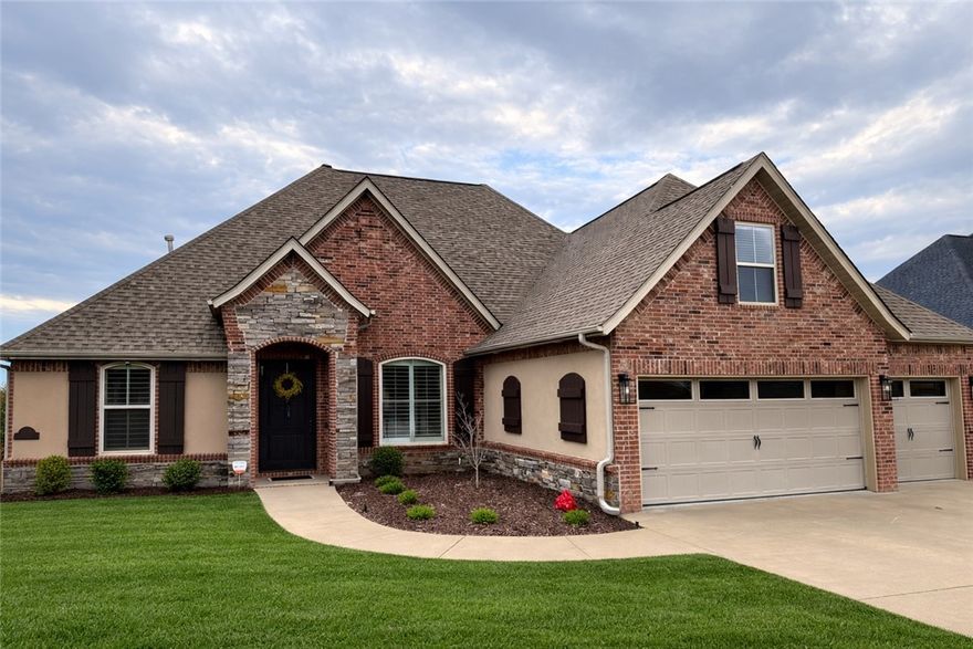 Well appointed & updated home in highly sought after Warren Glen Subdivision. Minutes from I-49, schools, shopping and biking trail. New wood flooring & tile throughout in 2021- including new carpet in 2025 on second level. All new quartz countertops, updated lighting, & new steam shower in primary bath in 2021.New roof in 2019. Media room with wet bar area for entertaining. In ground storm shelter in garage. Backyard features screened patio, pool bath, & vinyl pool with new liner in 2025. Must see!