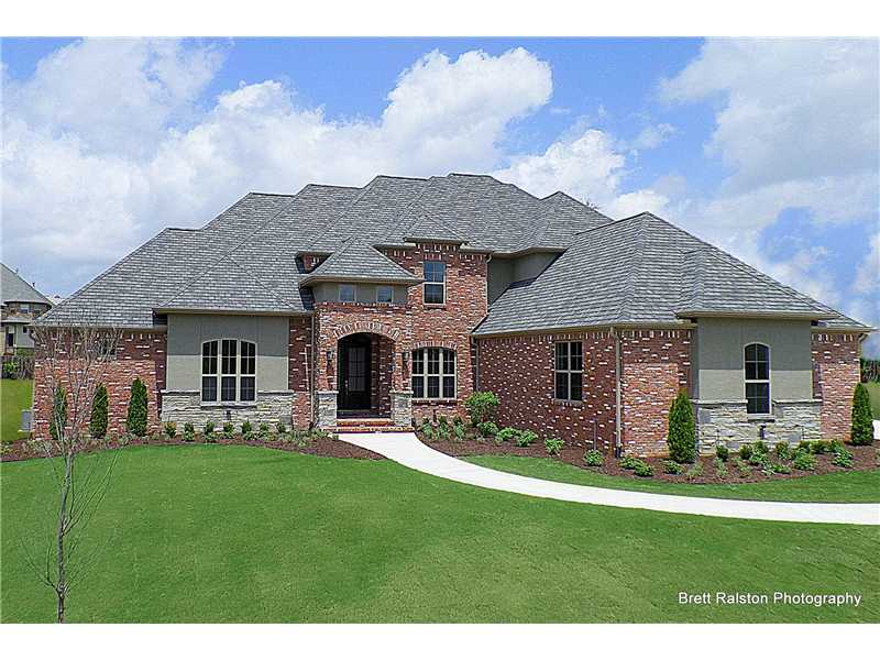 Quality, Impressive New Construction by Randall Johnson Bldrs, 4/2014. A fresh approach to luxury living. Custom cabinetry, Wolf app'l pkg., 2 FP, granite center island w/sink. Living area and cov. patio invites family time & informal gatherings.,Ensuite bdrs. Wet bar w/frig.,appointed w/glass tiles & granite off media/family rm. Incomparable MSTR. suite: Walk-in Shwr, whirlpool, 2 custom designed closets. Crown molding, hwd floors, designer lighting. All the details of a custom Home.