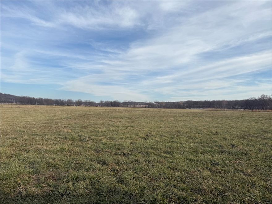 3.72+/- level acres with highway 62 frontage. Great build sites