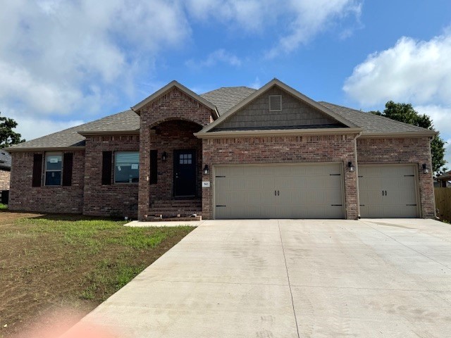 Builder will pay $2500 of buyers closing costs and prepaids with accepted contract. New all-brick construction! 1,557 sq. ft., 3 BR, 2 BA, 3 car garage plus granite tops, built-in shelves around the fireplace, premium wood vinyl plank floors, 2" faux wood blinds, split bedroom plan and a large walk thru closet in owner's suite. Full gutters, fully sodded yard, privacy fenced backyard.