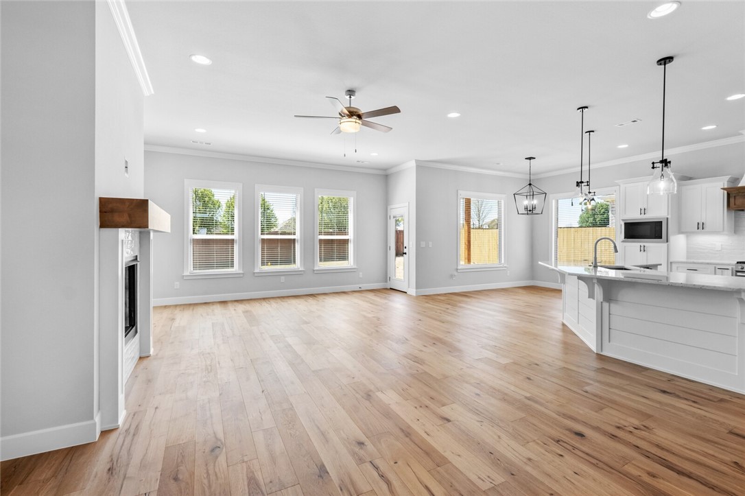 Seller will pay for $3,500 closing costs with $3000 preferred lender credit. Buyers must use the seller's preferred lender to take advantage of these incentives. The seller will pay up to $3,500 in closing costs with the buyer's lender of choice. This open floor plan with three bedrooms and 2.5 bathrooms is a must see! The kitchen's custom cabinets, granite countertops, and stainless steel appliances are fantastic things about this home. And, after a long day, the primary bedroom and en suite are the perfect places to relax and unwind. Plus, it's a bonus with a 3-car garage, fence, gutters, and a covered patio! Pictures are not of the actual home but a similar plan and finish. Taxes are based on land only.