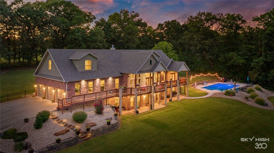 Welcome home to this captivating estate. Located just north of Pea Ridge on 11.25 acres.  Home offers a large formal dining room just off the kitchen. There is a 20x40 pool that is well lit with beautiful landscaping.  The walk out basement has an in home gym, as well as, a large entertainment room/ bar area with mini fridge and ice maker for entertaining guest. Two bonus rooms and an office are just a few additional extras on this beautiful property. Country living at its finest and a great place to call home and entertain friends.