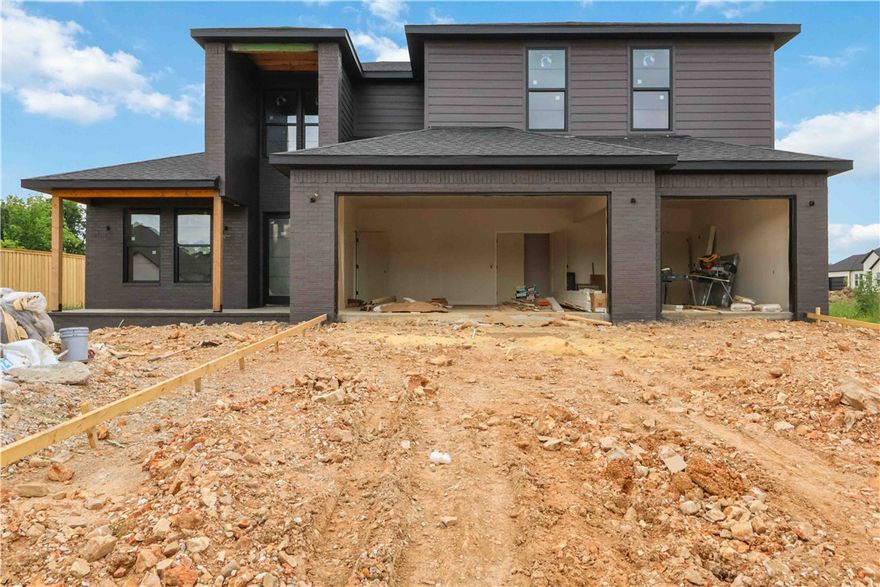 Welcome to this exceptional new construction, perfectly positioned on a picturesque 1-acre lot in the rolling hills of Northwest Arkansas. This elegantly crafted four-bed, three-bath home showcases refined custom finishes, from hand-selected fixtures to thoughtfully designed living spaces that blend modern sophistication with everyday comfort. A gourmet kitchen anchors the heart of the home, while a versatile bonus room offers added space for work, play, or relaxation. Superior craftsmanship is evident throughout, with premium materials chosen for lasting quality and timeless appeal. The expansive primary suite provides a serene retreat, and three additional bedrooms offer generous accommodations for family or guests. Step outside to an impressive acre of outdoor living—ideal for gardens, gatherings, or unwinding beneath open skies. Your fresh start begins here—schedule your private tour today.
