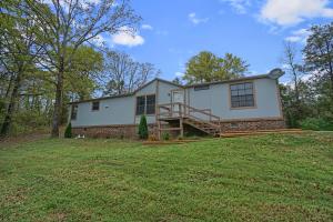 Totally remodeled home on just under an acre in Russellville ready to move into. It is just under 1600 feet with an open floor plan, three bedroom two baths out in the country. It is permanently attached to FHA specifications and will go FHA. Take a look today!