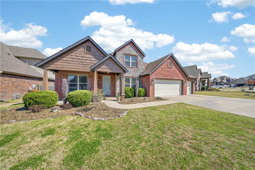 Spacious and beautifully updated home ideally located just minutes from the Walmart AMP, Pinnacle Hills shopping, Razorback Greenway, boutiques, coffee shops, & restaurants. Offering a rare 5 beds plus office, this nicely sized home has been freshly painted from floor to ceiling.  It offers a primary suite on the main level, along with an office downstairs, providing flexible living options. You'll also find a stunning dining room with a coffered ceiling and a well-appointed kitchen complete with waterfall quartz counters, a gas cooktop, under-cabinet lighting, a large island with built-in electric, walk-in pantry, and a butler’s pantry with wine storage and mini fridge—perfect for entertaining. Upstairs you’ll find 4 additional beds and 2 baths, incl. 1 ensuite. Outside enjoy a fenced yard, covered porch, gas fireplace, and TV for relaxing or entertaining. Additional highlights include solar panels, wired for sound, central vac hookup, a 3-car garage, storage building, and a fully fenced backyard.