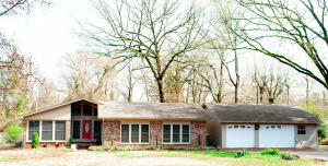 Don't miss out on this home in West Russellville! There is plenty of room for your family to grow with the 5 bedrooms, 3 bathrooms, and 2500 sq ft. With a dining room and eat-in kitchen, you can host Sunday dinner. The oversized garage will hold all your toys and give you ample space to tinker. 50 AMP RV hookup also so no need to rent a storage place for your RV.