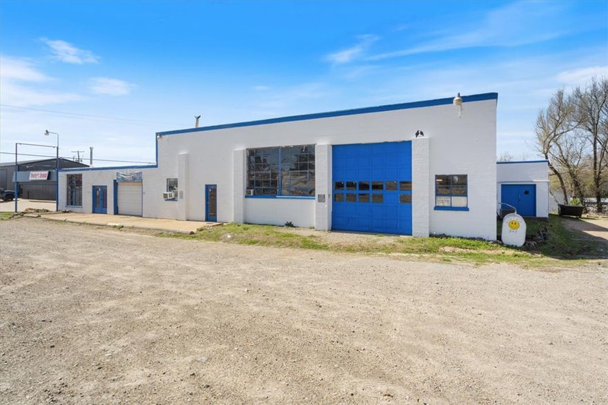 Opportunity is knocking! Dreaming of carving out a successful local business in the heart of town? This unique building will certainly position you to take advantage of the extremely high traffic count and all the added visibility that comes along with owning such a large building with tall marquee sign right on  HWY 62 between Wal-Mart and the Historic Berryville town square. While growing and building a brand this visibility will be crucial to your success. There are currently three separate units that could also be combined for one huge warehouse, mechanical/maintenance or even a specialty manufacturing application. The Gym is in the rear loading dock area & is currently being rented on a month to month basis. Up front there is a retail/office unit and let's not forget the massive mechanics garage with its high ceilings and large roll up door. The roof was replaced less than 10 years ago and the electrical in some areas/units has also recently been updated. Parking lot runs the entire length of the building.