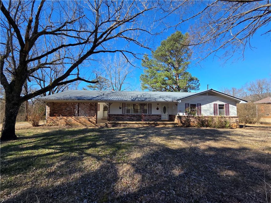 This is the kind of place people around here wait years for.

Located on 1 acre along Hwy 123 in Newton County, this well-maintained 3 bedroom, 2 full bath home offers true country living with mountain views in every direction. It has that classic old-country feel — solid, comfortable, and built for real living. Natural light fills the main spaces, and the lower level includes a drive-in basement area perfect for storage, equipment, or a workshop setup.

Outside you’ll find a very large detached shop on concrete slab with roll-up door, opener, wiring in place, and a new roof. The yard is wide open and usable, complete with mature walnut trees, an apple tree, and peach trees. A field behind the home adds privacy and uninterrupted views.

Homes in this small, tight-knit community rarely hit the market — and at $149,900, this is a big opportunity. If you’ve been waiting for peaceful, quiet mountain-country living, this is your shot.
