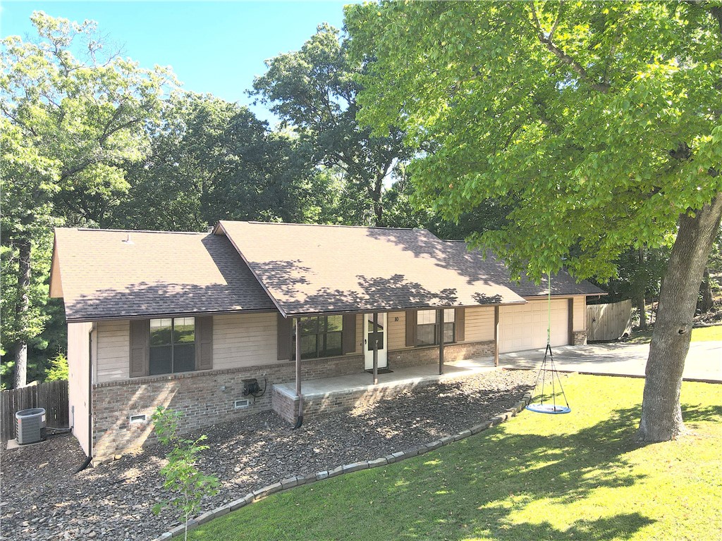 This beautifully maintained 2-bedroom, 2-bathroom home boasts an ideal location, nestled
along one of Bella Vistaās scenic biking trails. Just a short 10-minute walk away lies the
popular Blowing Springs Park and Beer Garden, making it a perfect spot for outdoor
enthusiasts. Upon entering, you are greeted by a spacious living room featuring vaulted
ceilings and large windows that flood the space with natural light. In addition to the two
bedrooms, the home includes two generous bonus rooms, providing versatile options for use,
such as a home office or additional living space.
The master bedroom features a walk-in closet with a built-
in safe and an en-suite bathroom. The two-car garage
includes an additional room connected to the central heating and air system. Outside, the
covered back deck invites you to relax and enjoy the views and sounds of the surrounding
forest, while a 2-mile biking trail at the rear of the property connects to an extensive network
of trails that define this vibrant area.