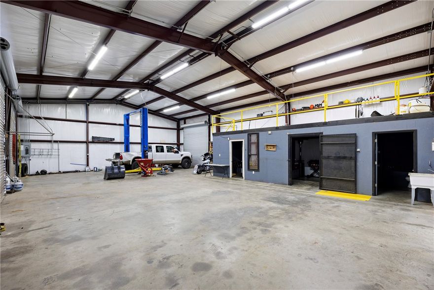 Currently leased with 1 tenant. One building is currently rented for $2300 a month, the second 2400 square foot shop is currently vacant and ready for the next business opportunity. This property includes 4.61 Acres and the sewer is running along the entire inside of this property for future expansions. The first building to the right as you enter is a Metal Shop 40 X 72 With roughly 800 Sqft that is office space. This building includes 4 Offices and 2 baths all heated and cooled by one Central Heat and Air unit. The second building to the left is a Metal Shop Newly built 60 X 40 with an Office, storage room and bathroom. This building includes 4 Roll up doors and a 12 Ton Car lift. Both buildings are setup with video cameras and full security around the property. This property is currently on one water meter and the water bill for both is paid by the seller. City sewer running on the exterior property line for possible future expansion.