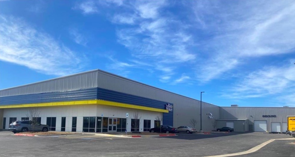 15 year lease with two 5 year options starting March 2022, NNN, 58,000 SF, 7% Cap.