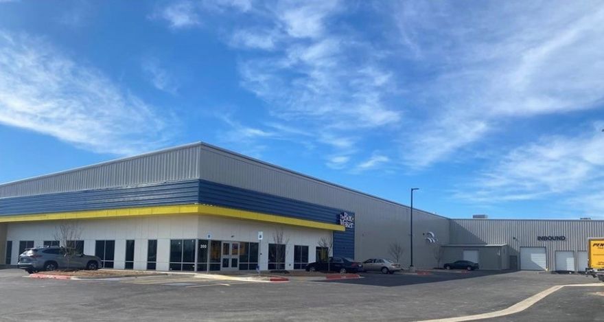 15 year lease with two 5 year options starting March 2022, NNN, 58,000 SF, 7% Cap.