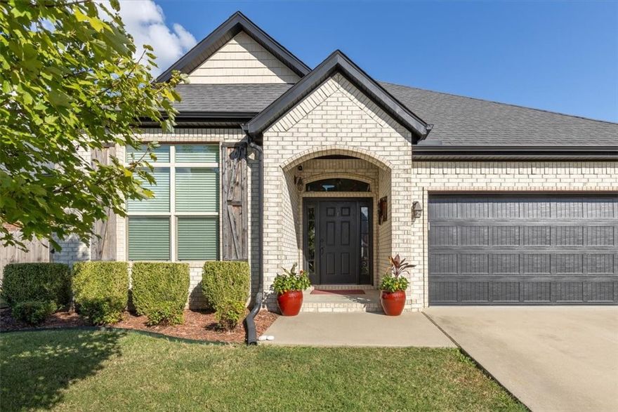 Situated in the highly sought-after Cornerstone Ridge community of Bentonville, this exceptional home perfectly blends sophistication, comfort, and style. Ideally located just minutes from Walmart Headquarters, Coler Mountain Bike Preserve, and vibrant Downtown Bentonville, with easy access to I-49 only four miles away. Featuring an open and inviting floor plan, the home showcases a beautifully designed kitchen with a spacious center island, abundant cabinetry, stainless steel appliances, and a gas range. The bright living area highlights a brick gas fireplace, crown molding, and elegant engineered hardwood flooring. The primary suite offers a private retreat complete with a spa-inspired bath featuring dual vanities, a jetted tub, a walk-in shower, and a generous walk-in closet. A versatile bonus room provides flexibility for a fourth bedroom, home office, or playroom. Enjoy outdoor living on the covered patio and extended wood deck, perfect for relaxing evenings or entertaining guests.