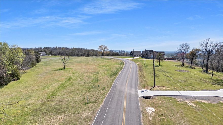 LOT #27 (4.41 Acres) This is our largest lot remaining with potential galla creek and mountain views! The newest Subdivision in Russellville, Eagle Crest! Seller is willing to Owner Finance! 7.5% Interest Rate -With approved credit- First time on the Market. This property is right beside Richland Hills, Cove Landing and Cliff & Stream. Just minutes from town with amazing views of Galla Creek Lake, Russellville and you can even see Mtn Nebo. These will not last long at all. Schedule your showing today. Fiber Internet