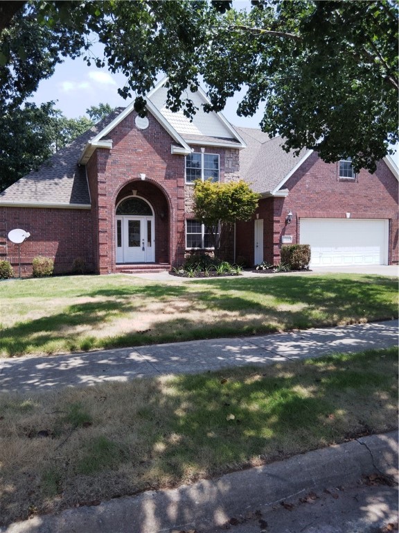 PRIME LOCATION! This might be your last chance to move in on the doorstep of 8th Street Gateway Park. Nestled between Gateway and Coler Creek, this 4-bedroom, 3.-bathroom home offers a great location and private back patio, a split floor plan, large primary suite and three additional bedrooms Downstairs, has private features, while the upstairs bedroom and bonus room for media room. . East-facing backyard that is shaded from the afternoon sun, ideal for gardening or play. Situated on a quiet street, this home is within walking distance to two neighborhood access points of the Applegate Greenway, Coler Creek Preserve, and only 5 short minutes from downtown. Bentonville West zoned.